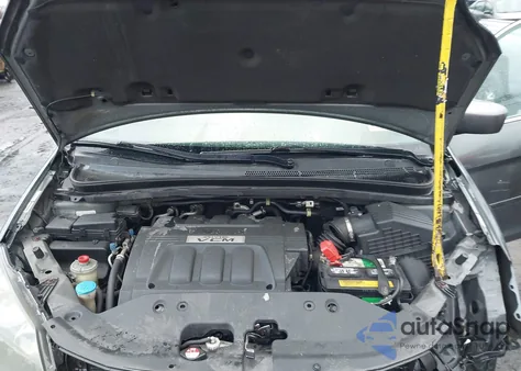 2010 Honda Odyssey Exl z USA, uszkodzony, nr VIN 5FNRL3H78AB015933